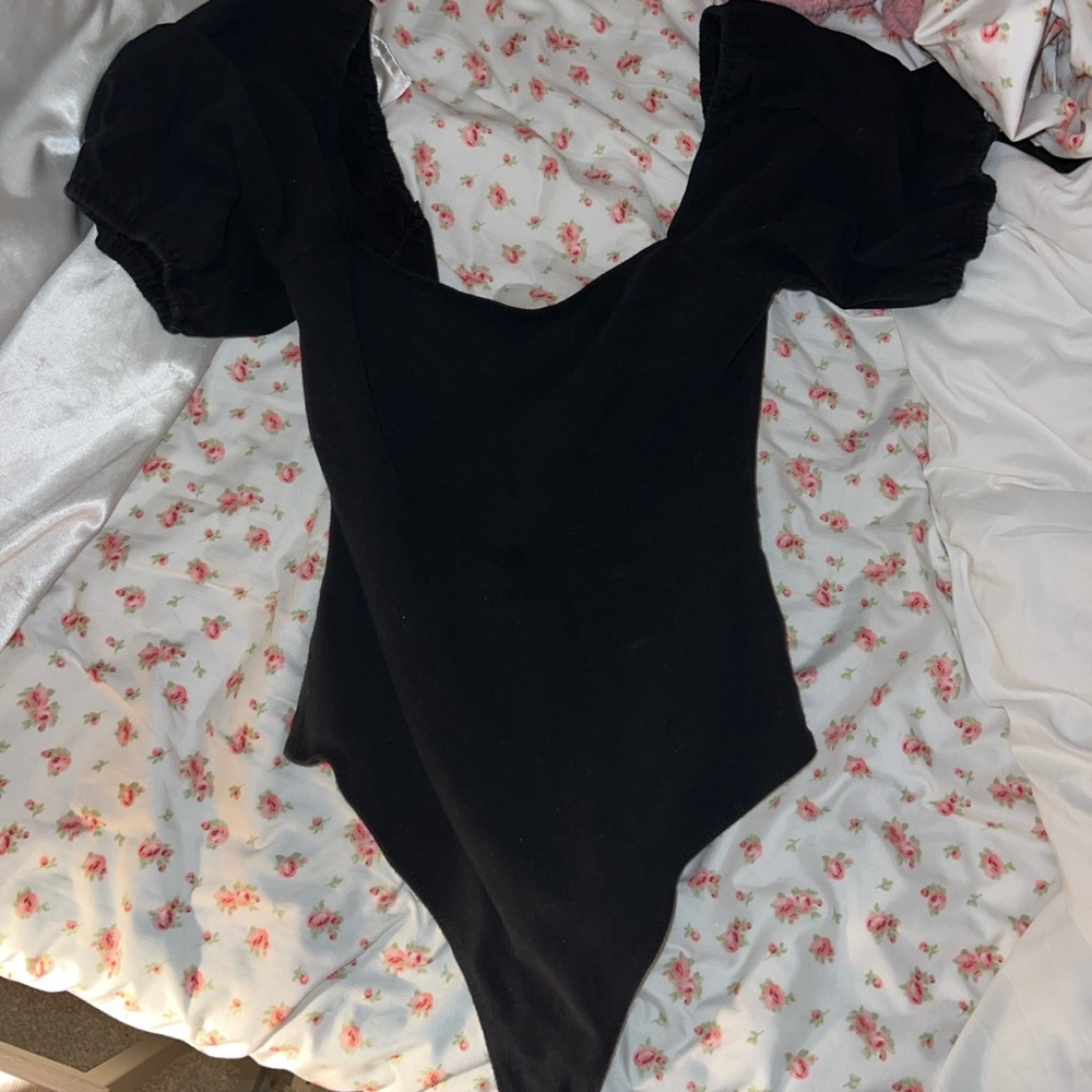 Black puffy sleeved body suit! Open back with ties.
